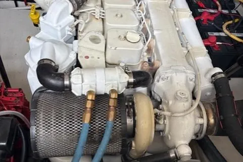 Ocean Cloud Yacht Photos Pics Engine of a 2001 Tiara Yachts 3500 Open, showcasing mechanical components and hoses.
