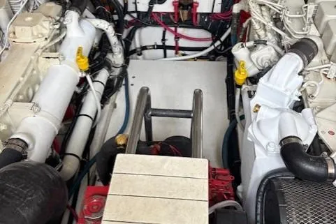Ocean Cloud Yacht Photos Pics Engine compartment of a 2001 Tiara Yachts 3500 Open, showcasing dual engines and components.