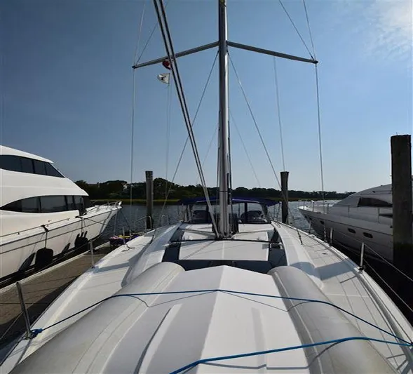  Yacht Photos Pics 2019 Beneteau 51.1 sailboat docked, showcasing sleek deck design and mast.