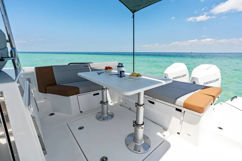  Yacht Photos Pics 2025 Beneteau Flyer 9 SUNdeck, spacious deck with seating, table, and ocean view.