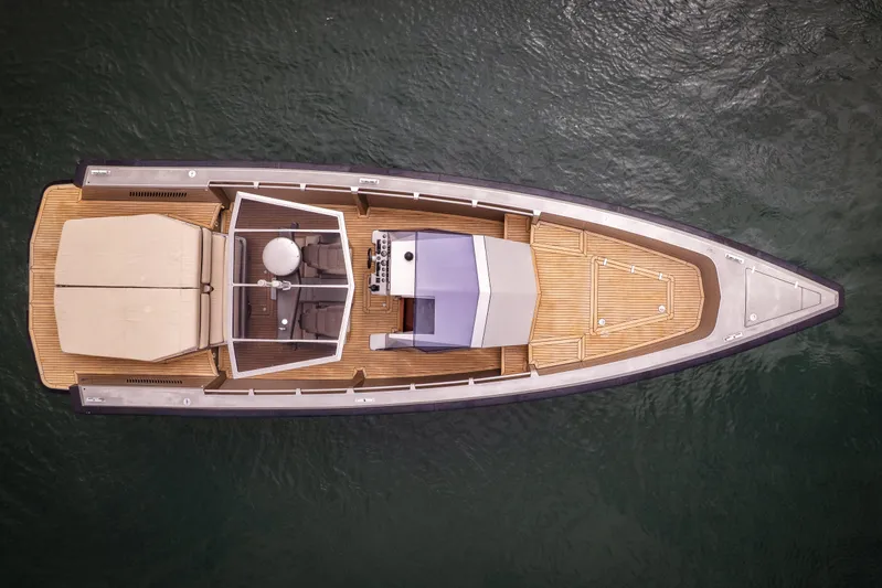 Fan Sea II Yacht Photos Pics Top view of 2005 Wally Yachts Tender Express on water, showcasing sleek design and deck layout.