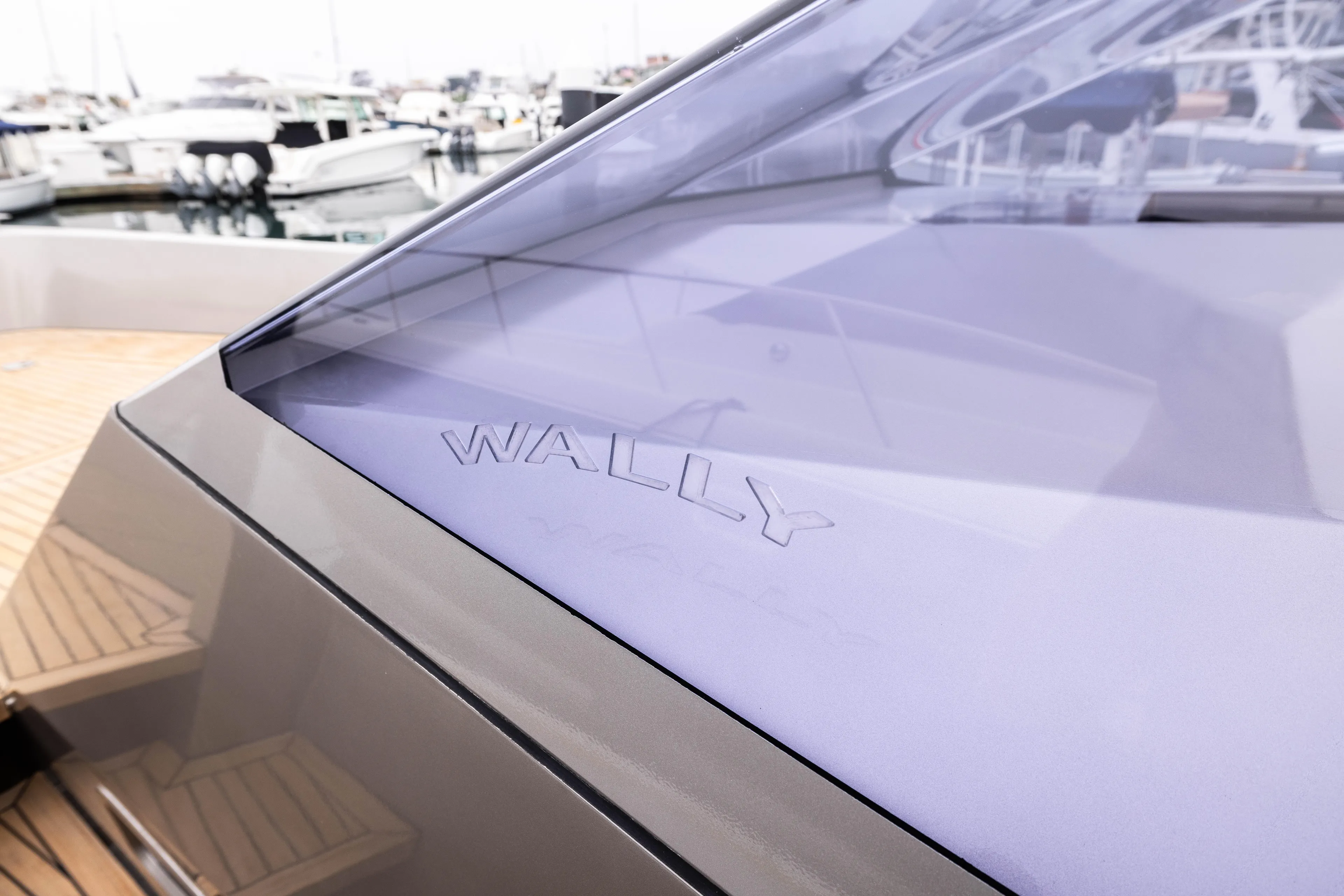 Fan Sea II Yacht Photos Pics 2005 Wally Yachts Tender Express with sleek design, docked at marina.