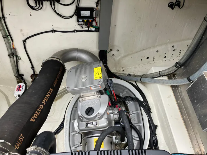 Yacht Photos Pics Engine compartment of a 2016 Targa 44 CFC boat, featuring Volvo Penta components.
