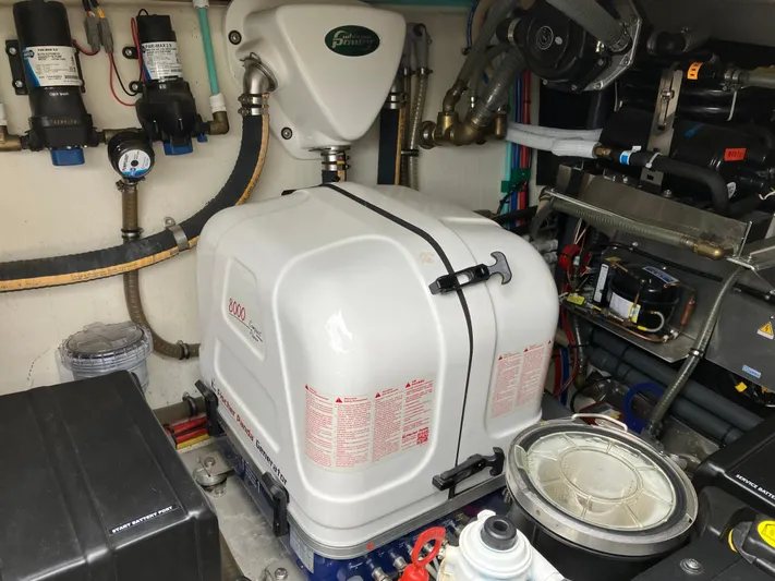  Yacht Photos Pics Engine room of 2016 Targa 44 CFC boat, featuring mechanical components and equipment.