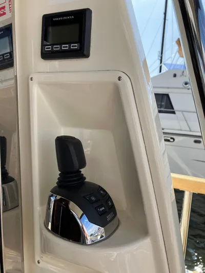  Yacht Photos Pics Control panel and joystick of a 2016 Targa 44 CFC boat.