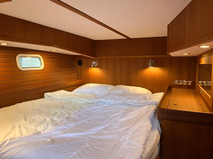  Yacht Photos Pics Luxurious cabin interior of 2016 Targa 44 CFC yacht with cozy bedding.