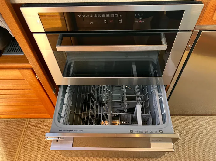  Yacht Photos Pics Modern kitchen with open Fisher & Paykel dishwasher in Targa 44 CFC, 2016 model.