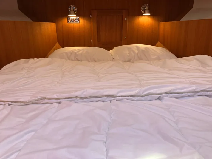  Yacht Photos Pics Cozy cabin bed with white bedding in 2016 Targa 44 CFC boat.