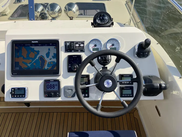  Yacht Photos Pics Control panel of a 2016 Targa 44 CFC boat with navigation equipment.
