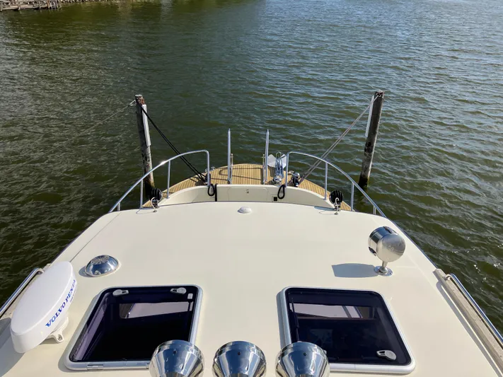  Yacht Photos Pics Targa 44 CFC 2016 yacht bow view, docked on calm water.