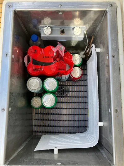  Yacht Photos Pics Targa 44 CFC 2016 cooler with assorted drinks, including cans and bottles.