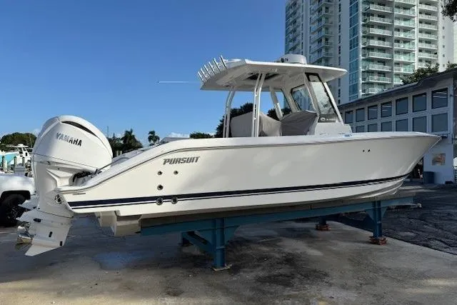  Yacht Photos Pics 2025 Pursuit S 288 Sport boat on display with Yamaha engine.