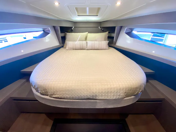 In Stock Yacht Photos Pics 2023 Beneteau Gran Turismo 41 cabin with a cozy bed and modern design.