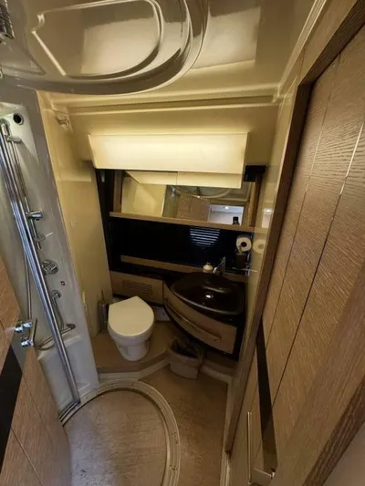  Yacht Photos Pics Luxurious bathroom in 2012 Azimut 64 yacht with modern fixtures and elegant design.