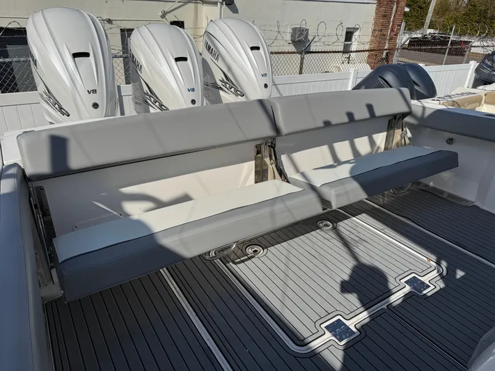  Yacht Photos Pics 2022 Everglades 395cc boat with triple V8 engines and spacious seating area.