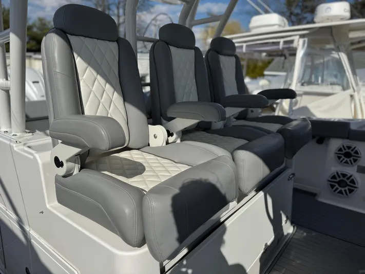  Yacht Photos Pics Luxury seating on 2022 Everglades 395cc boat, featuring gray and white upholstery.