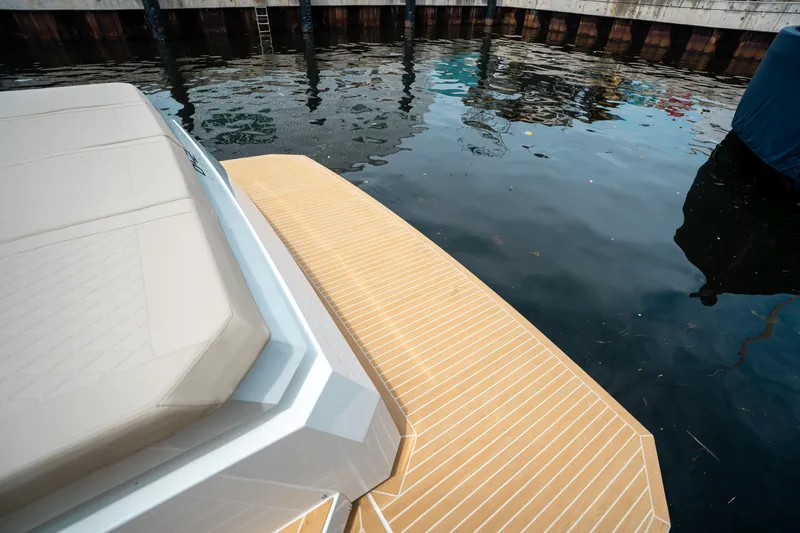  Yacht Photos Pics 2025 De Antonio Yachts D42 Open, docked with sleek deck design.