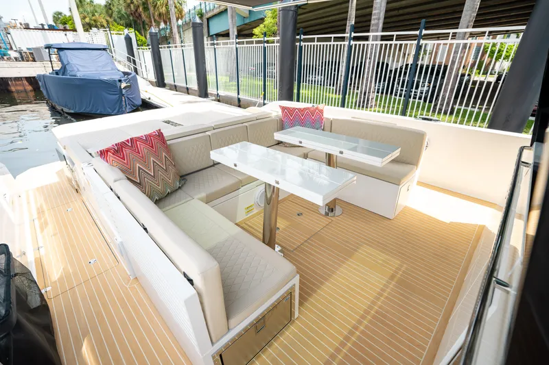  Yacht Photos Pics Luxurious seating area on 2025 De Antonio Yachts D42 Open with modern design and cushions.