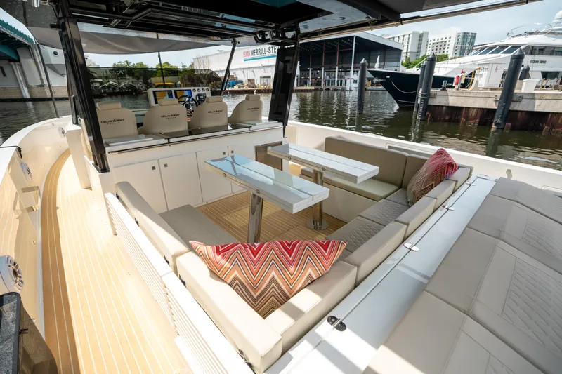  Yacht Photos Pics 2025 De Antonio Yachts D42 Open, luxurious seating area with modern design and waterfront view.