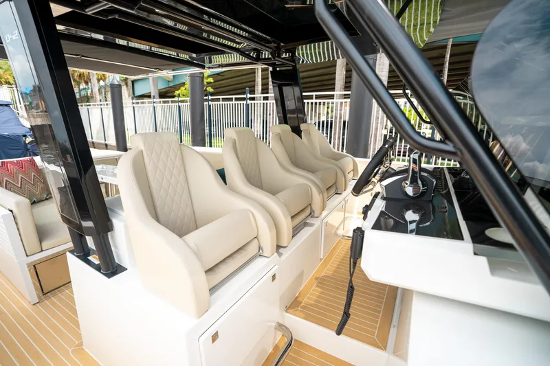  Yacht Photos Pics 2025 De Antonio Yachts D42 Open helm with luxurious seating and modern controls.