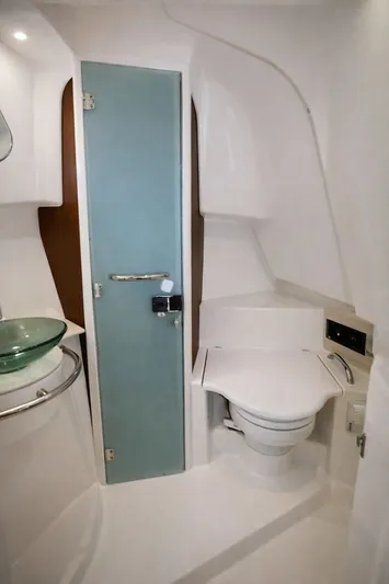 Cast Strength Yacht Photos Pics Interior of 2016 Pursuit OS 345 Offshore with toilet and sink.