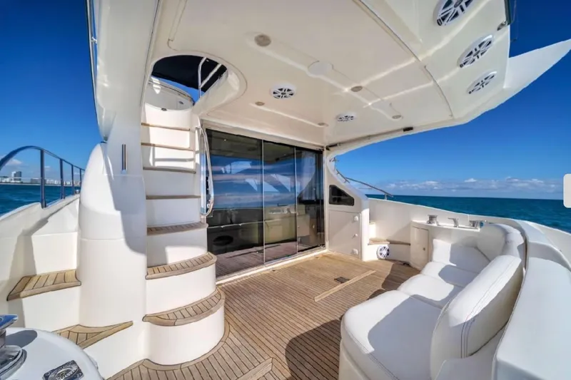  Yacht Photos Pics Luxurious 2005 Azimut 50 yacht deck with elegant seating and ocean view.