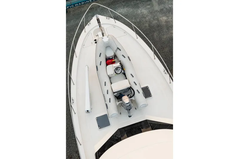  Yacht Photos Pics 2017 Maritimo M 51 yacht with inflatable boat on deck, viewed from above.