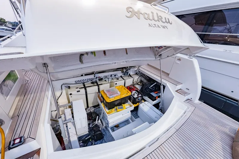  Yacht Photos Pics 2017 Maritimo M 51 yacht engine compartment with open hatch and visible equipment.