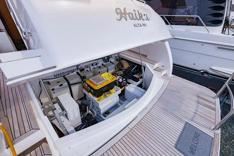  Yacht Photos Pics 2017 Maritimo M 51 yacht with open engine compartment, showcasing equipment and storage.