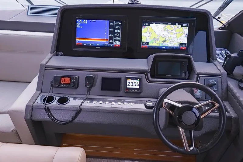  Yacht Photos Pics Helm of 2017 Maritimo M 51 yacht with navigation screens and controls.