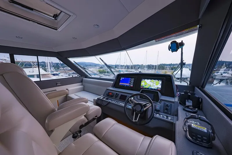  Yacht Photos Pics 2017 Maritimo M 51 yacht helm with modern navigation systems and luxurious seating.