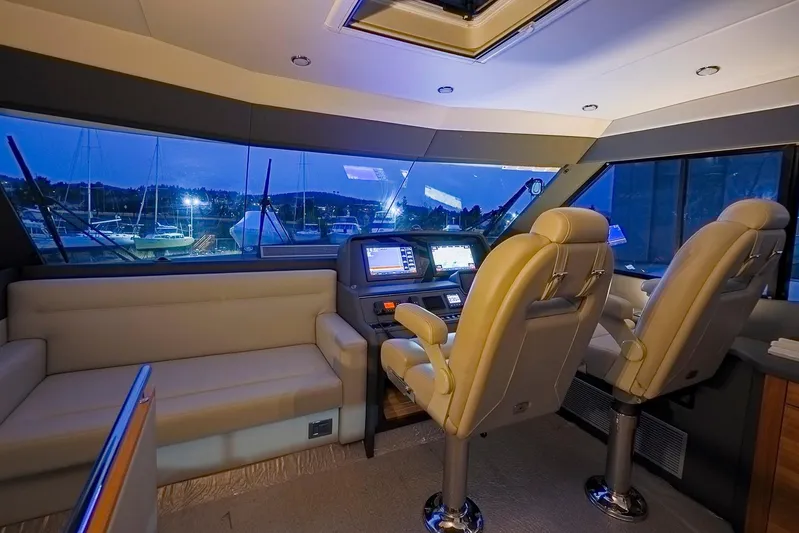  Yacht Photos Pics Luxurious 2017 Maritimo M 51 yacht interior with plush seating and advanced navigation controls.