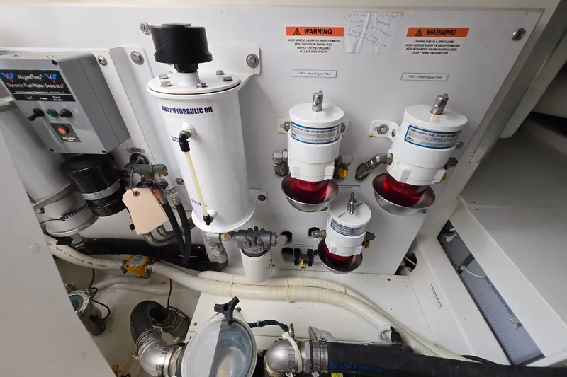  Yacht Photos Pics Engine room of 2017 Maritimo M 51 yacht with hydraulic oil and fuel filters.