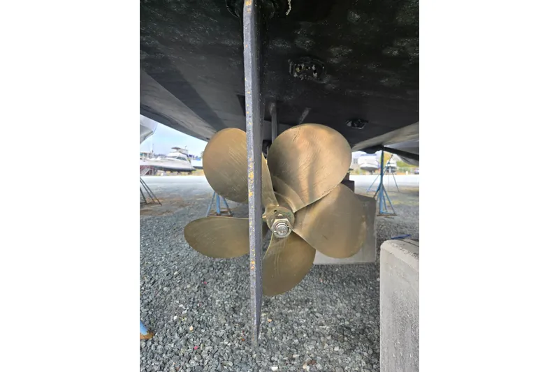  Yacht Photos Pics Propeller of 2017 Maritimo M 51 yacht on gravel surface.