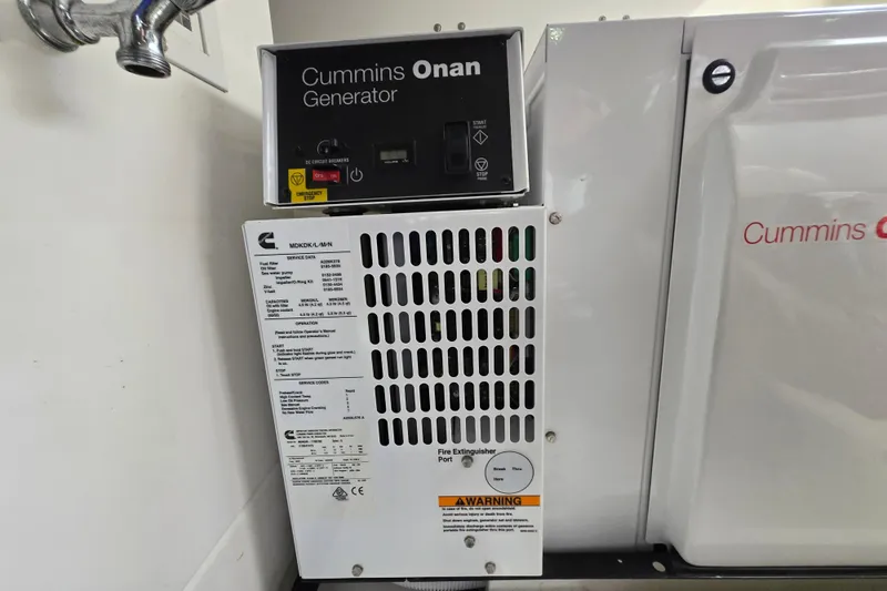  Yacht Photos Pics Cummins Onan generator in 2017 Maritimo M 51 yacht engine room.