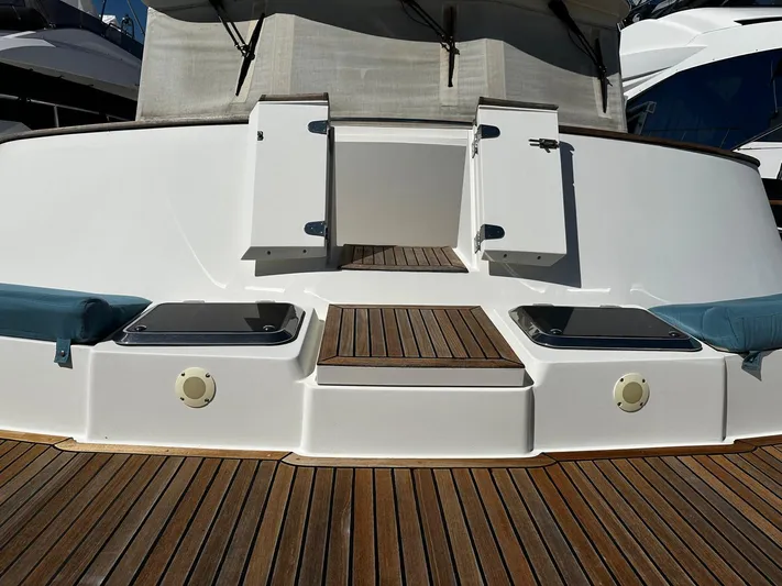 Smaragd Yacht Photos Pics Stern view of 2003 Fleming 55 yacht with teak decking and seating.