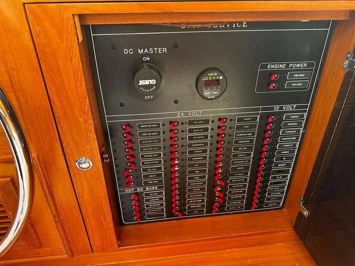 Smaragd Yacht Photos Pics Electrical panel on a 2003 Fleming 55 yacht, featuring DC master and engine power controls.