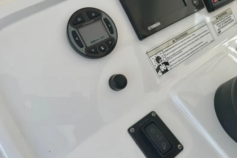  Yacht Photos Pics Control panel of a 2019 Intrepid 407 Panacea boat featuring Yamaha and Lumishore systems.