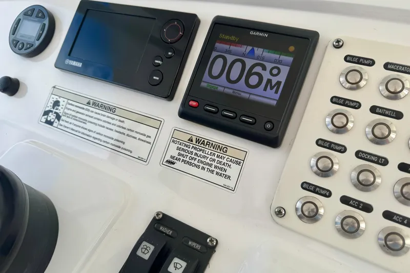  Yacht Photos Pics Control panel of a 2019 Intrepid 407 Panacea boat with Garmin and Yamaha displays.
