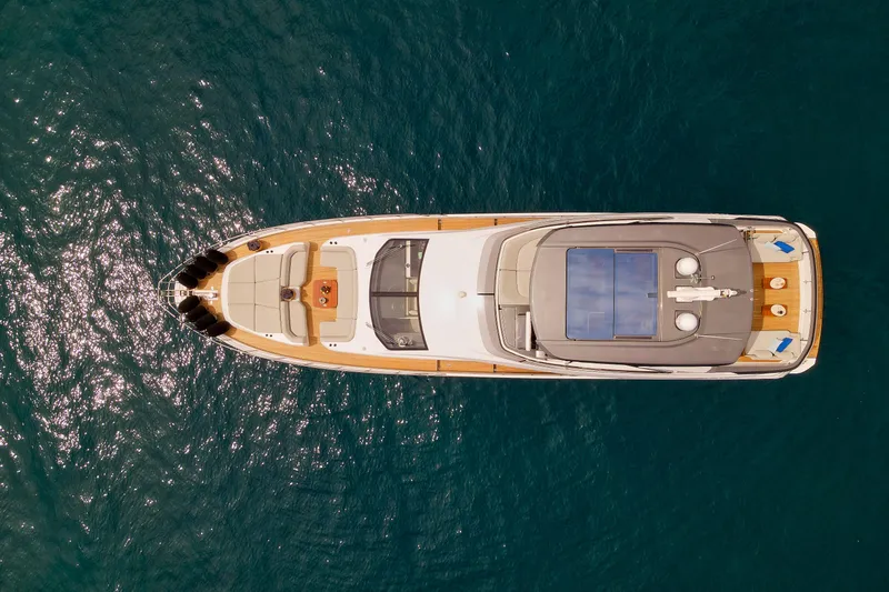  Yacht Photos Pics Overhead view of 2022 Azimut 78 yacht on clear blue water.