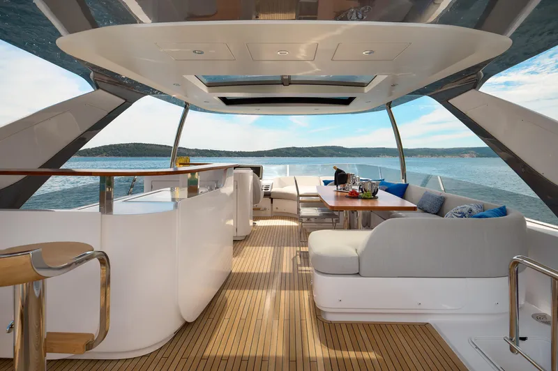  Yacht Photos Pics Luxurious 2022 Azimut 78 yacht interior with elegant seating and ocean view.