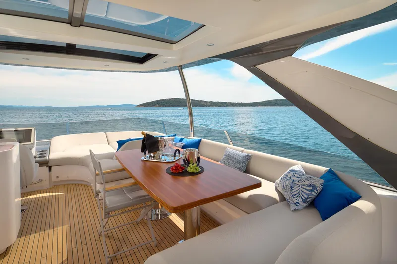  Yacht Photos Pics Luxurious 2022 Azimut 78 yacht interior with elegant seating and ocean view.