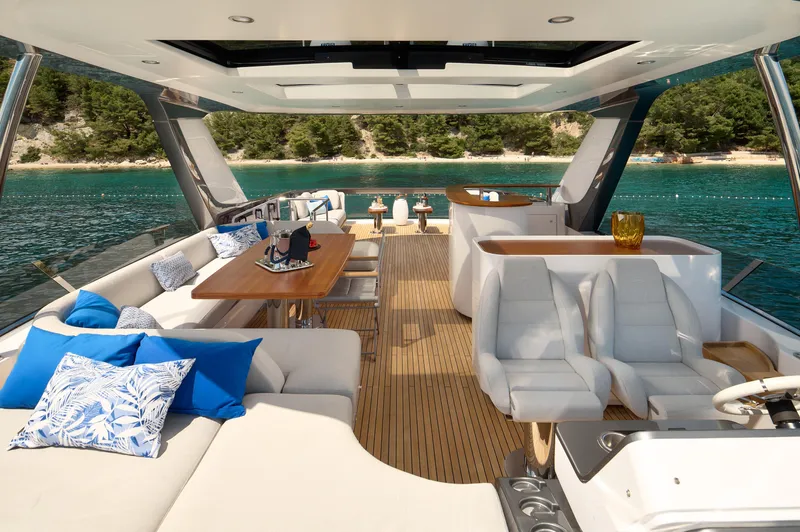  Yacht Photos Pics Luxurious 2022 Azimut 78 yacht interior with elegant seating and scenic ocean view.