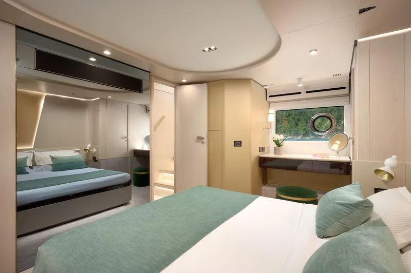  Yacht Photos Pics Luxurious interior of 2022 Azimut 78 yacht with elegant bedroom and modern decor.