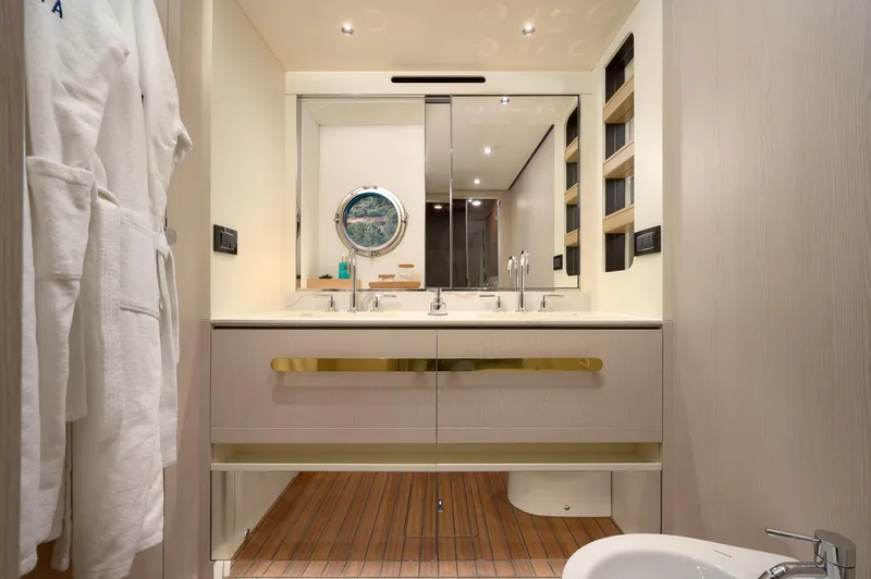  Yacht Photos Pics Luxurious bathroom interior on 2022 Azimut 78 yacht with modern fixtures and elegant design.