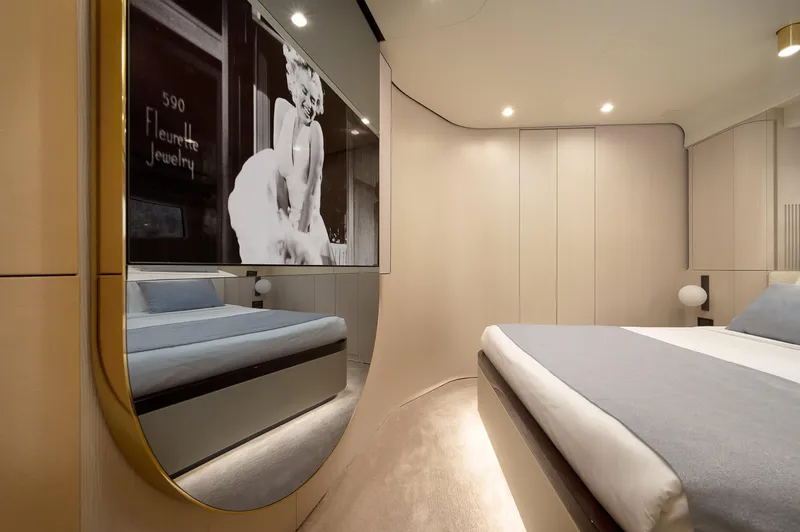  Yacht Photos Pics Luxurious bedroom interior on 2022 Azimut 78 yacht with elegant decor and stylish artwork.