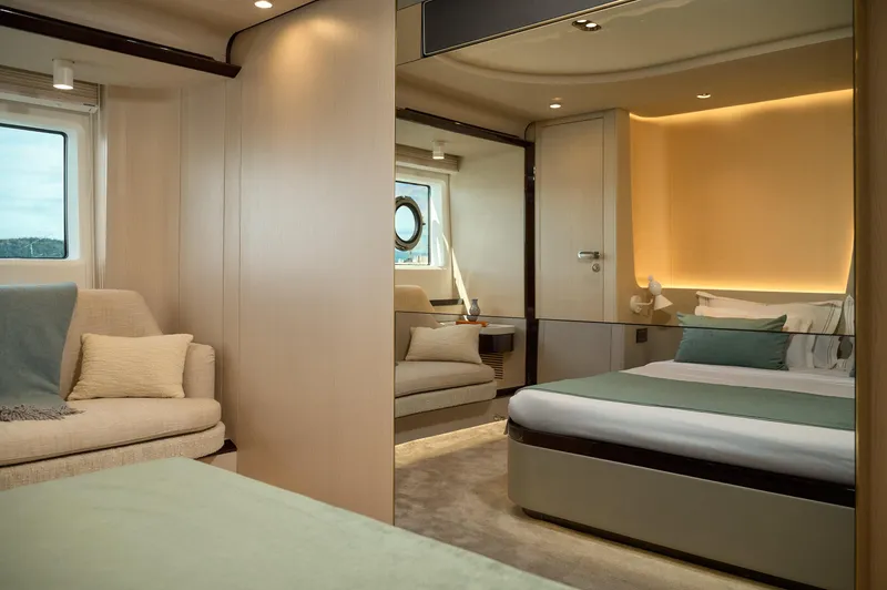  Yacht Photos Pics Luxurious interior of 2022 Azimut 78 yacht with modern bedroom and seating area.