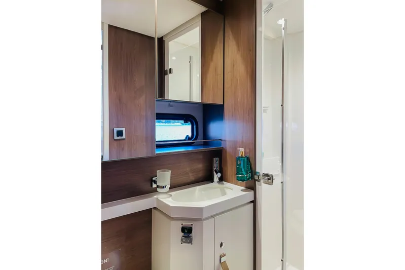 Signature Bali 5.4. (6+ 2 Cabins) Yacht Photos Pics Modern bathroom interior in 2022 Bali 5.4 model yacht, featuring sleek design and compact amenities.