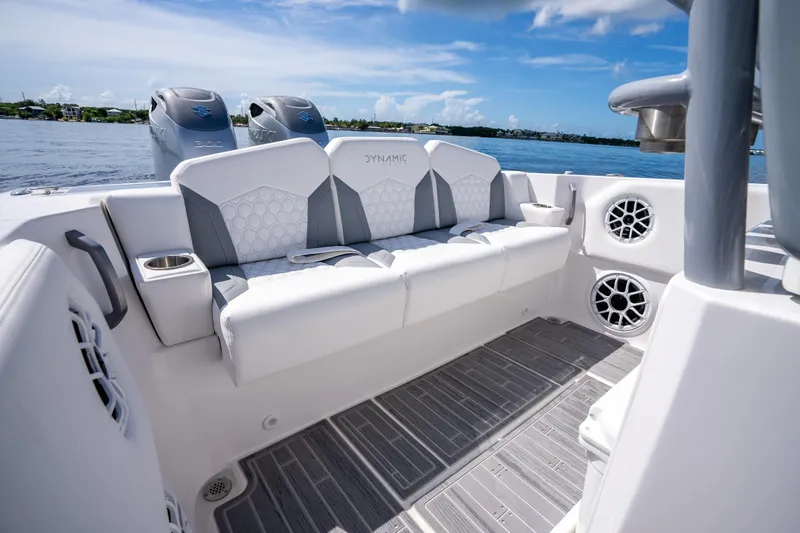  Yacht Photos Pics Luxury seating on 2023 Dynamic D-305V boat with ocean view and modern design.