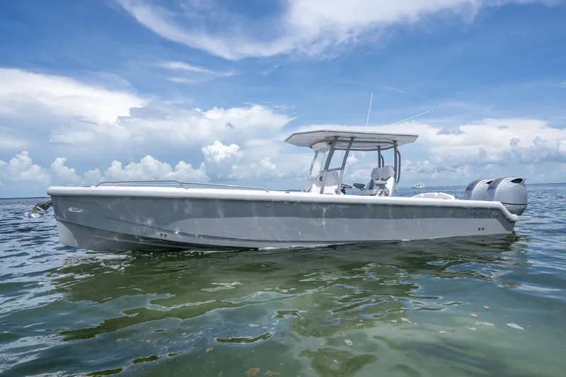  Yacht Photos Pics 2023 Dynamic D-305V boat on calm water under a clear blue sky.